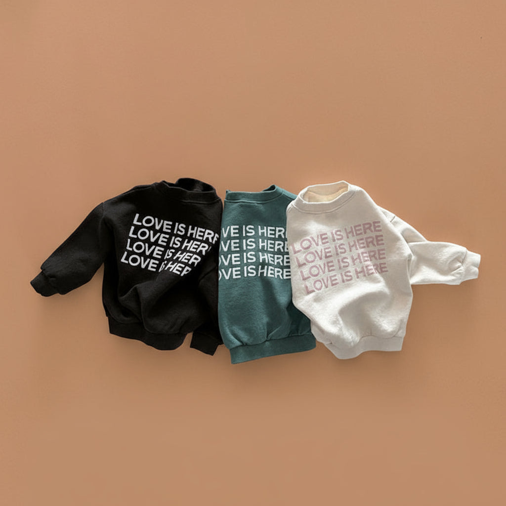 Love is Here Sweatshirt null