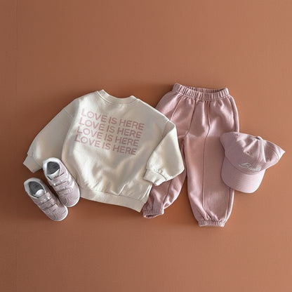 Love is Here Sweatshirt null