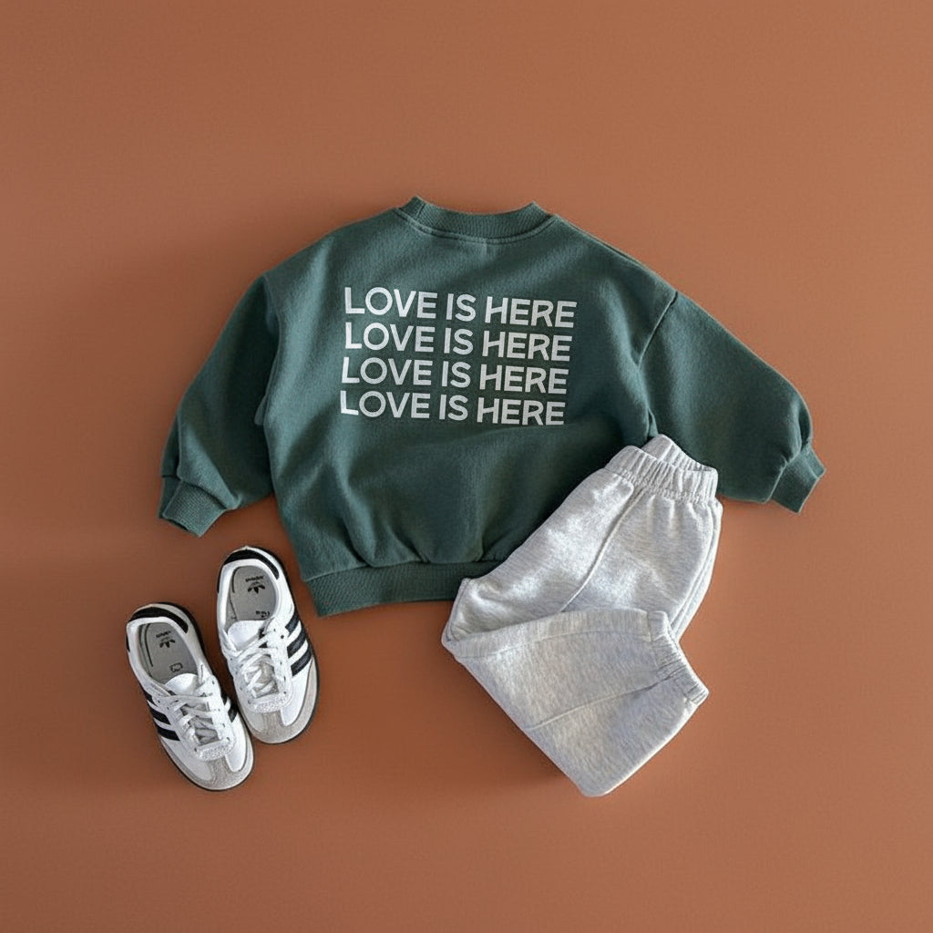 Love is Here Sweatshirt null