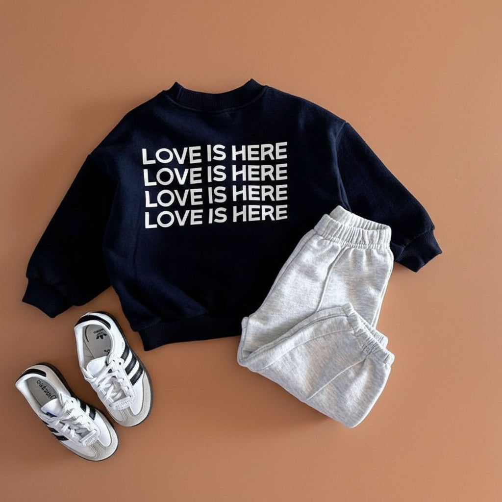 Love is Here Sweatshirt null