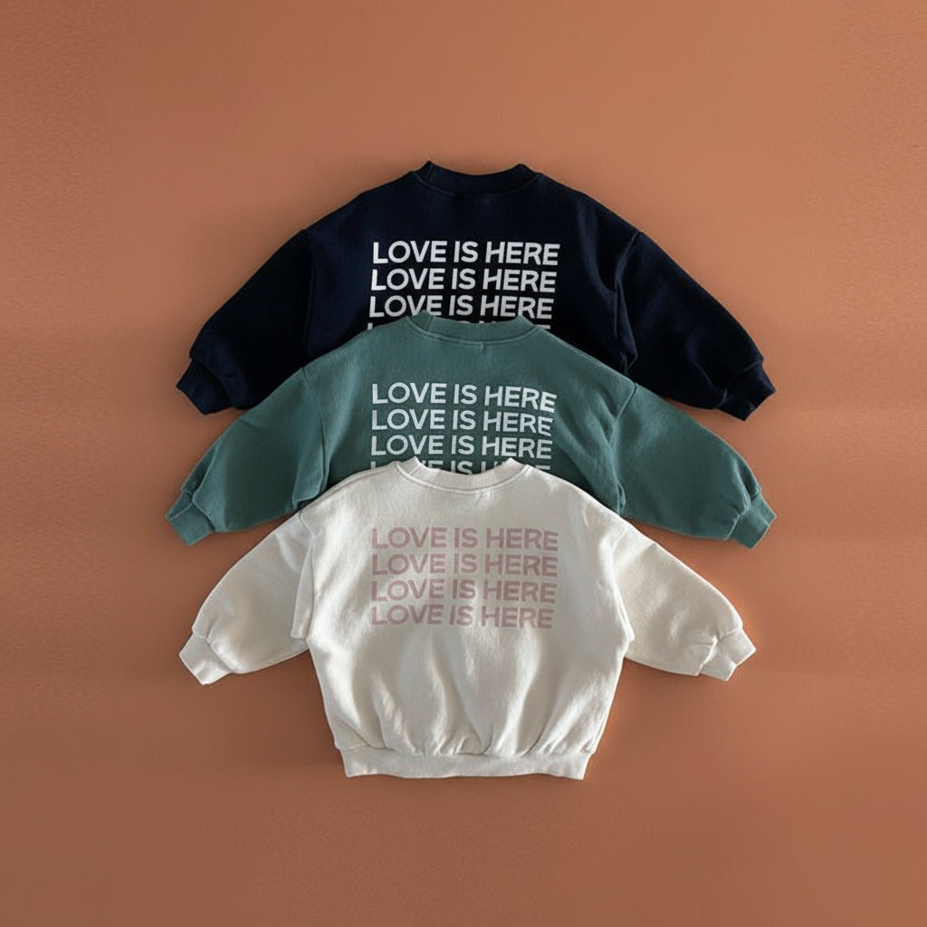 Love is Here Sweatshirt null